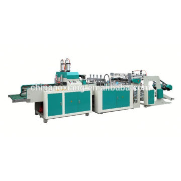 Automatic t-shirt bag on roll making machine